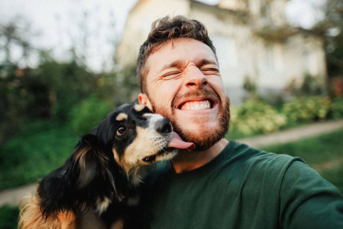 Man hugging his dog